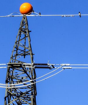 The picture shows a structure for the suspension of overhead electric lines 