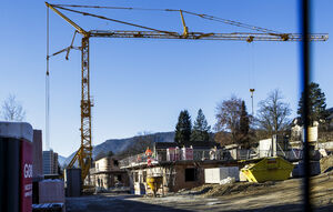 The picture shows a residential complex of the Carinthian urban development under construction.